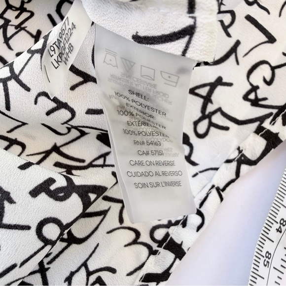 Woman’s Karl Lagerfeld Paris Blouse Size Small
White With Black Lettering - Picture 8 of 8